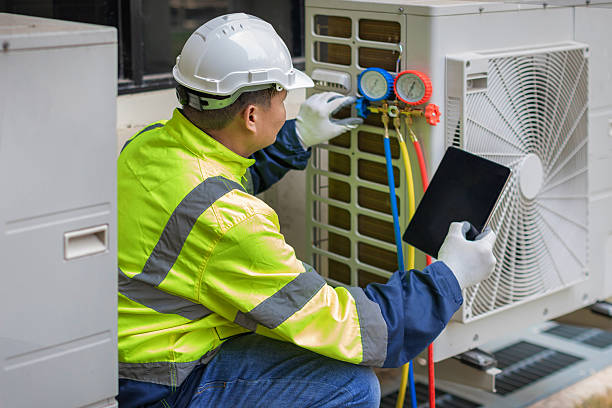 Professional Air Duct Cleaning technician working in Uncasville, CT